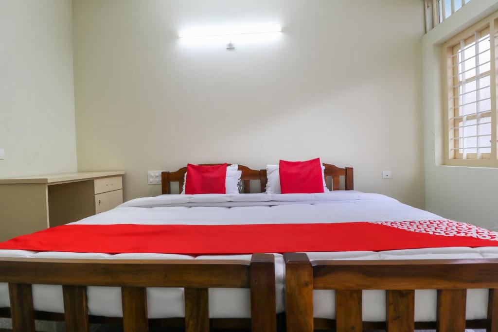 Postel nebo postele na pokoji v ubytování Hotel O Appas Residency
