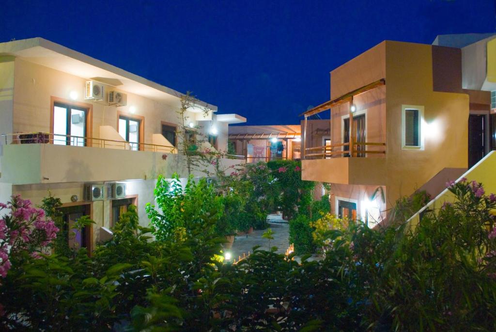 an aerial view of an apartment complex at night at Lito Apartments Paleochora in Palaiochora