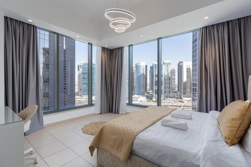 Posteľ alebo postele v izbe v ubytovaní Silverene Towers Dubai Marina - By Home Of Choice