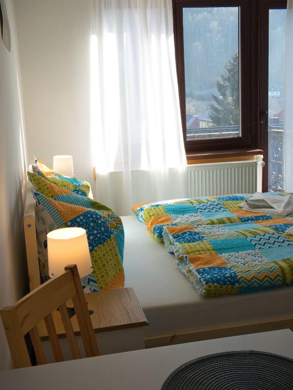 Postel nebo postele na pokoji v ubytování Vila Pramínek, Horní Maršov, Krkonoše