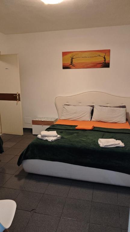 Postel nebo postele na pokoji v ubytování Center Elite