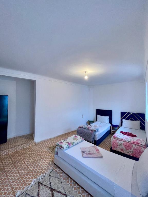 Postel nebo postele na pokoji v ubytování Red Vibes Hostel Marrakech
