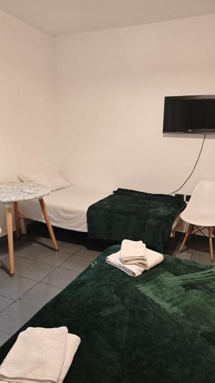 Postel nebo postele na pokoji v ubytování Center Elite