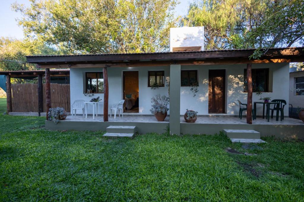 Zahrada ubytování Algarrobo Luz Cabañas