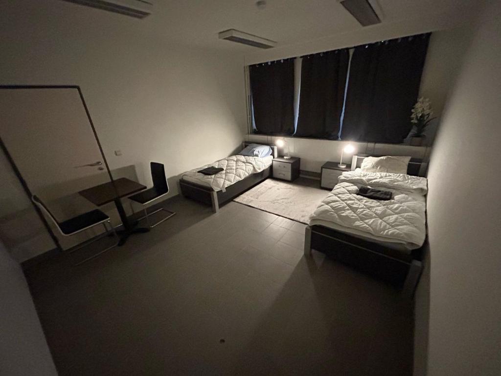 Postel nebo postele na pokoji v ubytování Rooms Exit E40