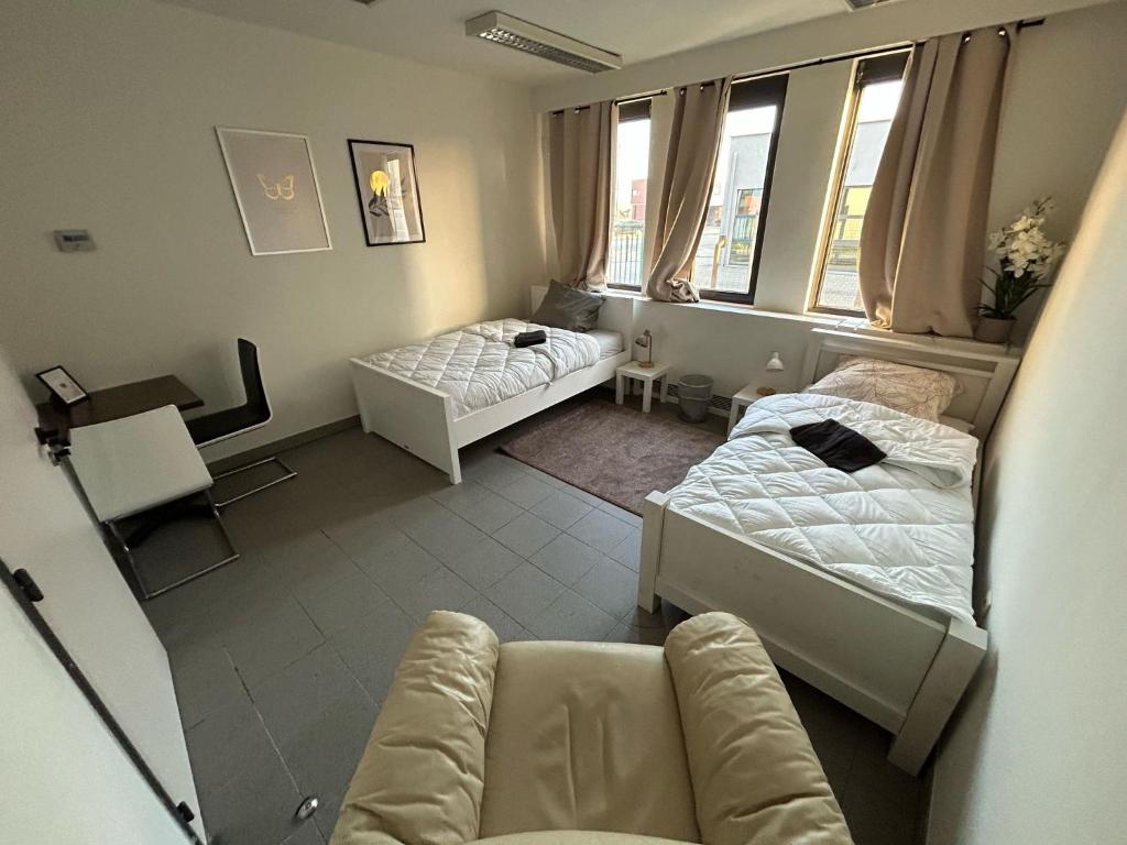 Postel nebo postele na pokoji v ubytování Rooms Exit E40