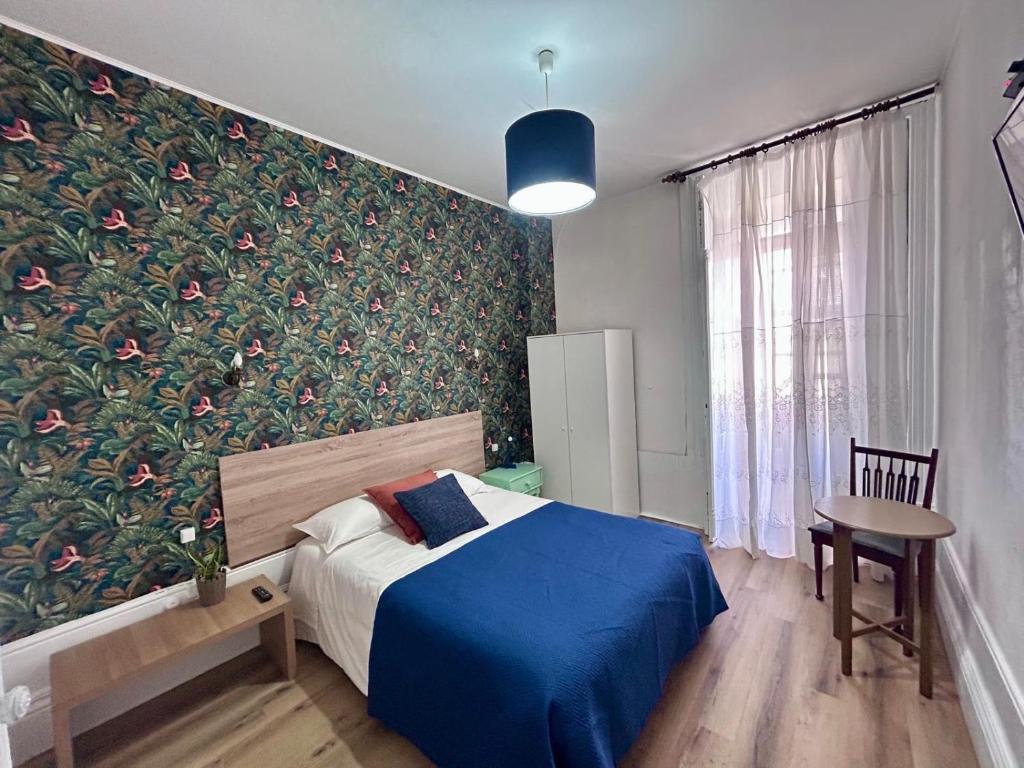 Ένα ή περισσότερα κρεβάτια σε δωμάτιο στο Monte Sinai Guest House
