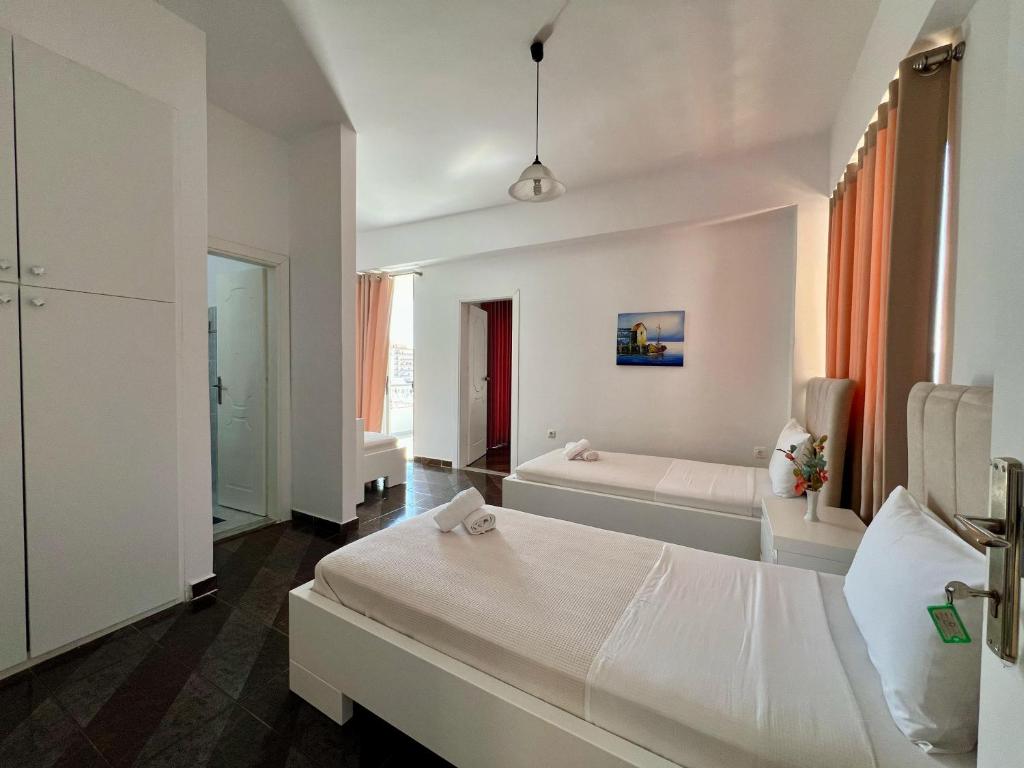 Postel nebo postele na pokoji v ubytování Hotel Oxhaku