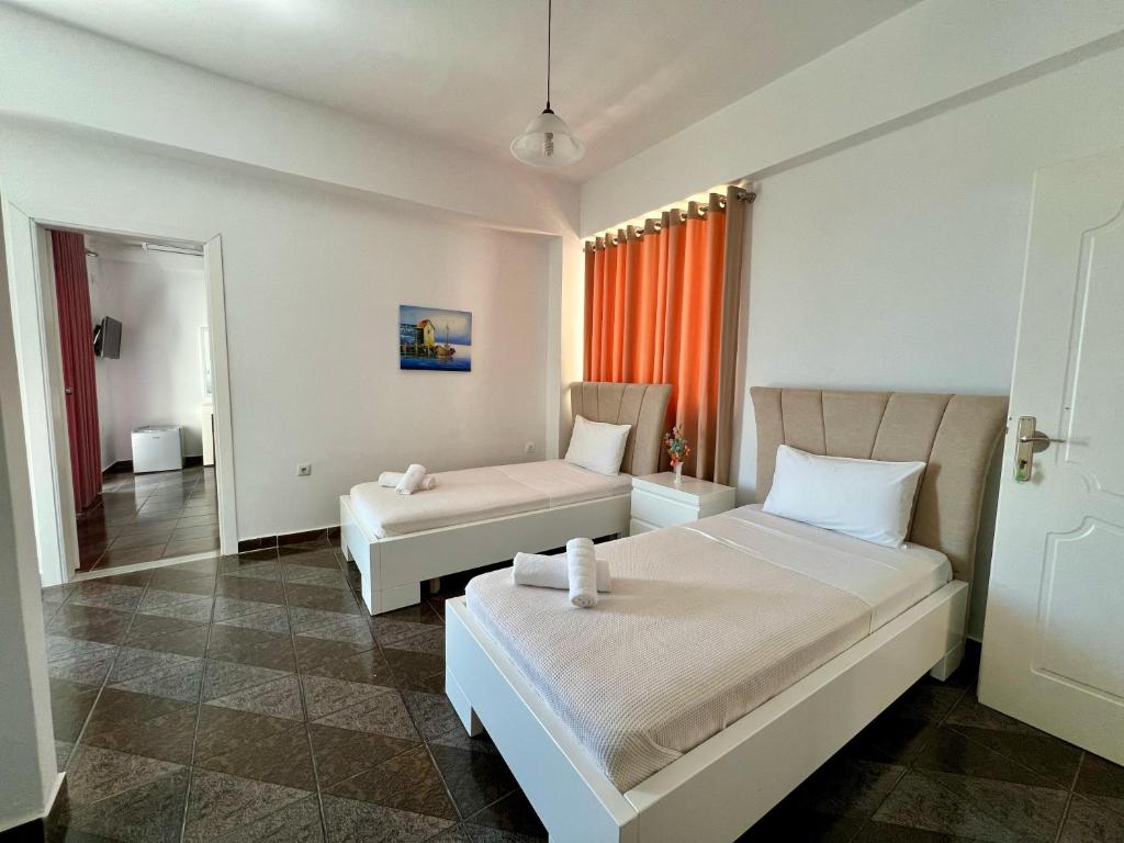 Postel nebo postele na pokoji v ubytování Hotel Oxhaku