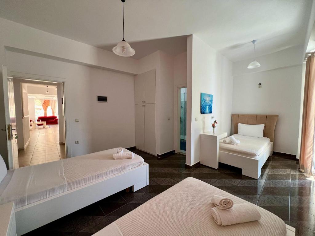 Postel nebo postele na pokoji v ubytování Hotel Oxhaku