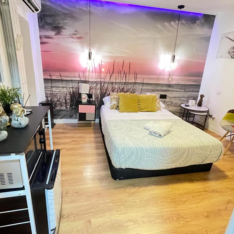 En eller flere senge i et værelse på Habitación loft centro