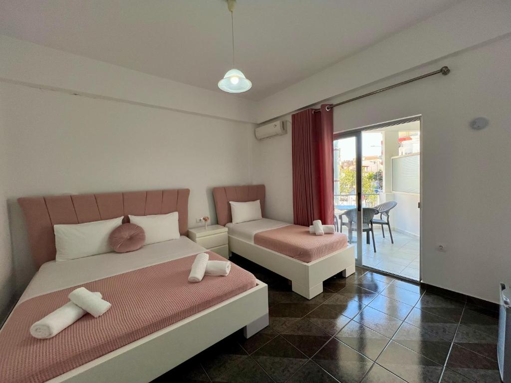 Postel nebo postele na pokoji v ubytování Hotel Oxhaku