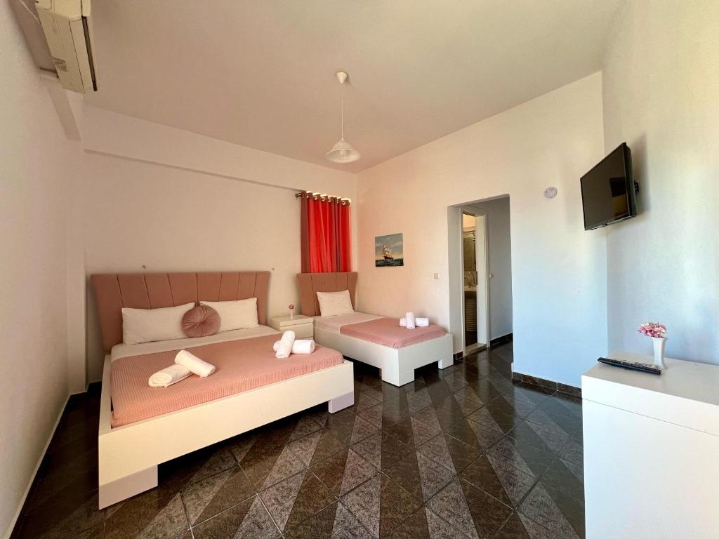 Postel nebo postele na pokoji v ubytování Hotel Oxhaku