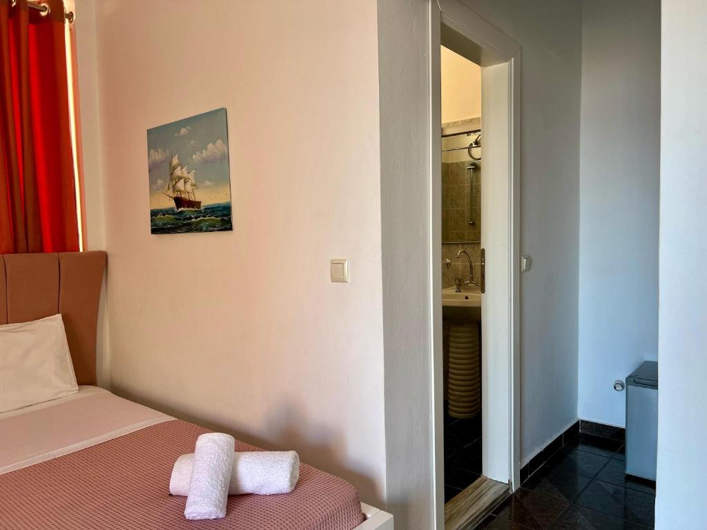 Postel nebo postele na pokoji v ubytování Hotel Oxhaku