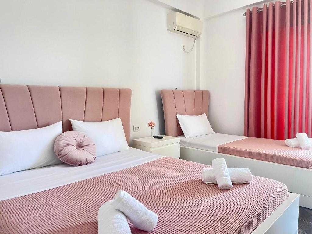 Postel nebo postele na pokoji v ubytování Hotel Oxhaku