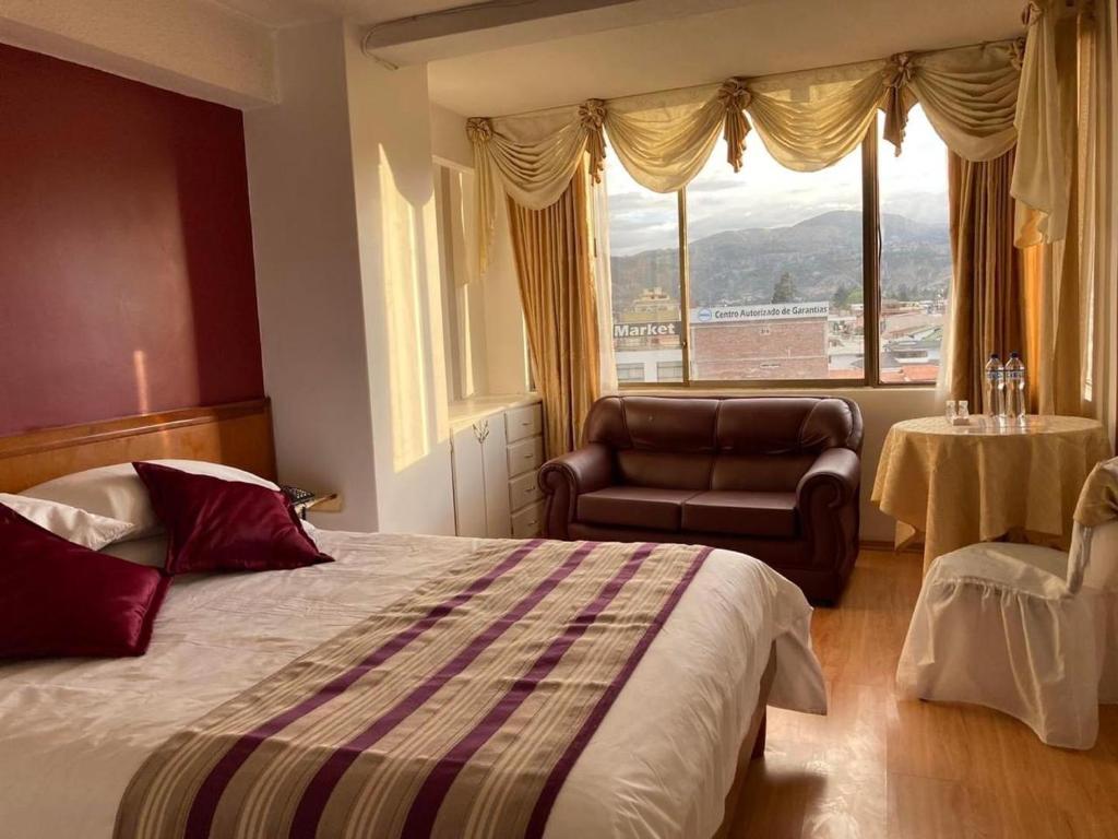 Postel nebo postele na pokoji v ubytování Hotel El Cisne Internacional