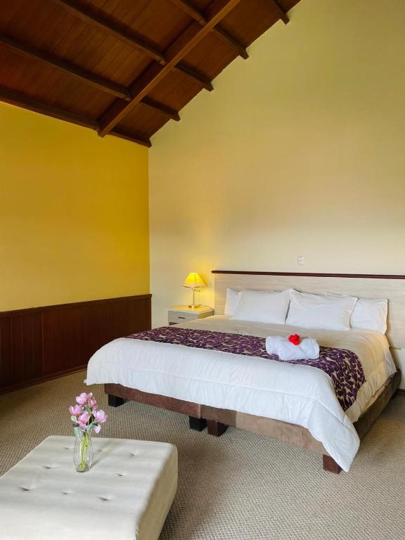 Postel nebo postele na pokoji v ubytování Minkana Hotel