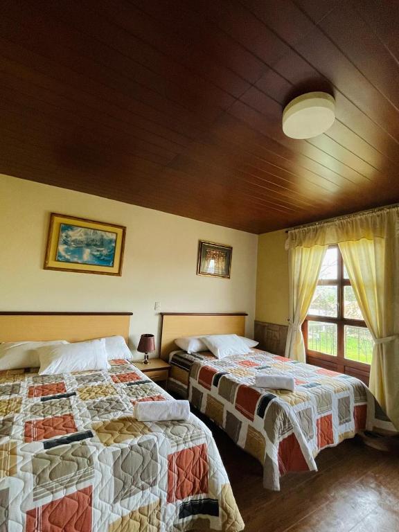 Postel nebo postele na pokoji v ubytování Minkana Hotel