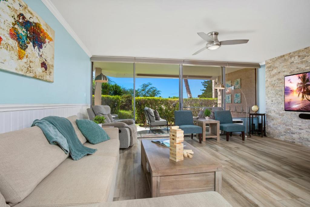 a living room with a couch and chairs at Remodeled 1BR at Kihei Ali'i Kai with Free Parking! in Kihei