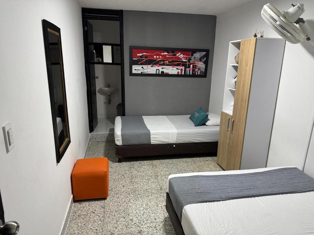 Postel nebo postele na pokoji v ubytování Hotel JC 43