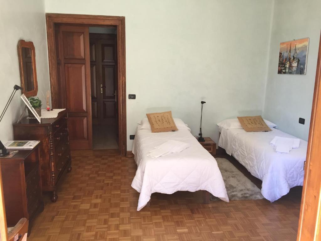 Postel nebo postele na pokoji v ubytování B&B Santa Lucia