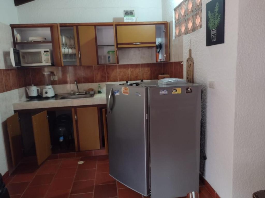 Kuchyň nebo kuchyňský kout v ubytování Aires de Encanto