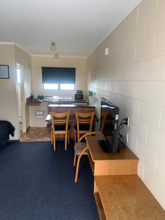 Kuchyň nebo kuchyňský kout v ubytování Wayfarer Motel