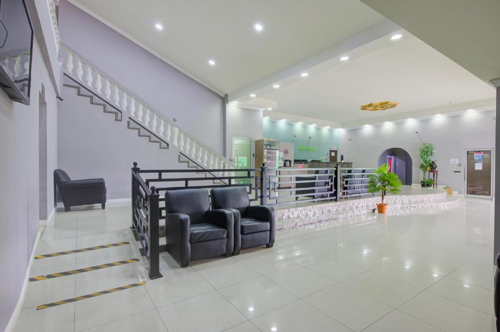 Posezení v ubytování Airport Suites Hotel