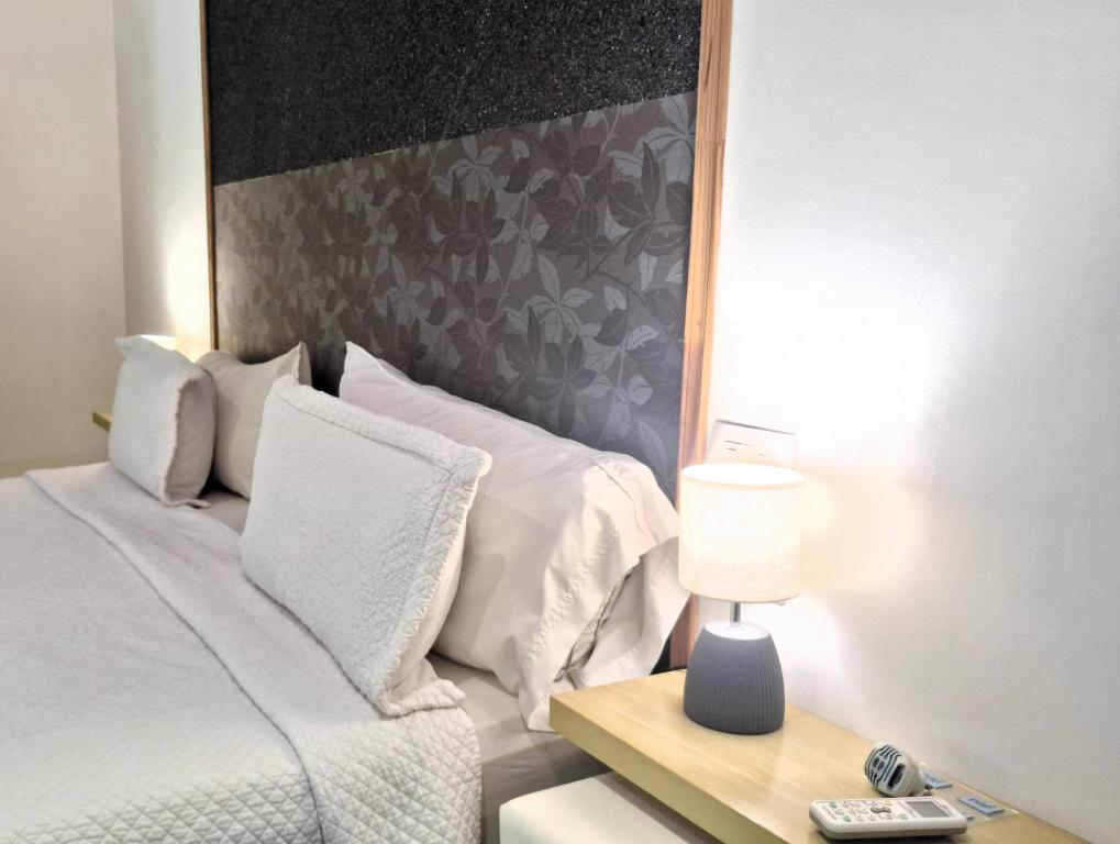 Postel nebo postele na pokoji v ubytování La Locanda