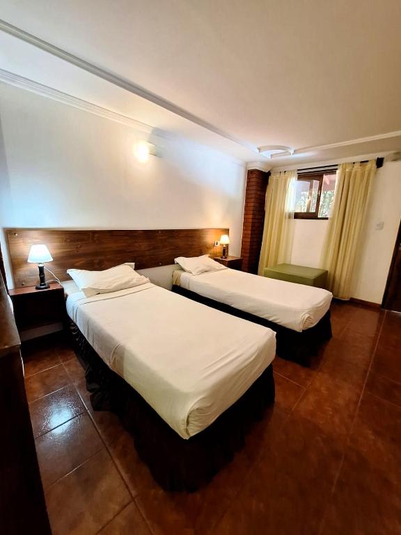 Postel nebo postele na pokoji v ubytování La Locanda