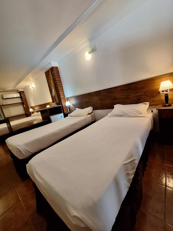 Postel nebo postele na pokoji v ubytování La Locanda