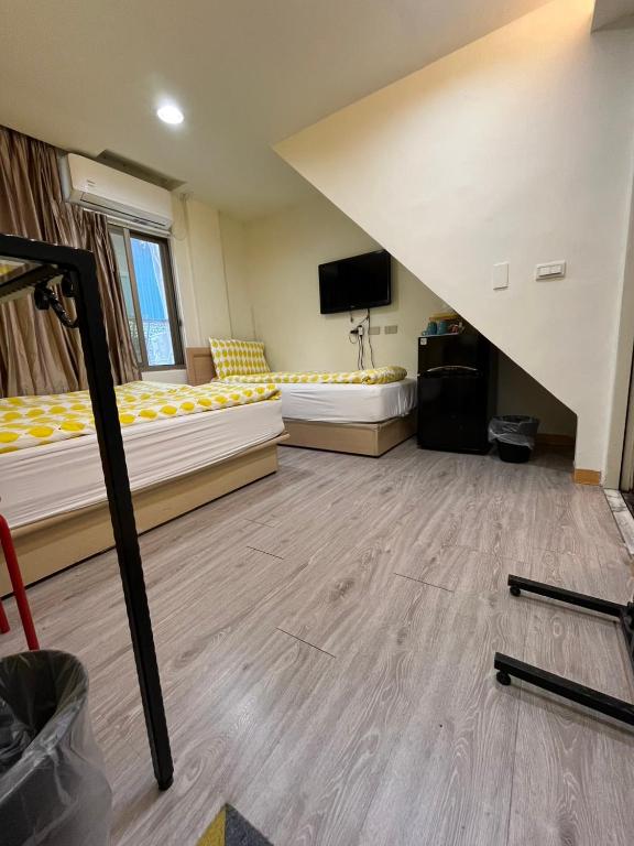 TV a/nebo společenská místnost v ubytování Taipei Triple Tiger Inn