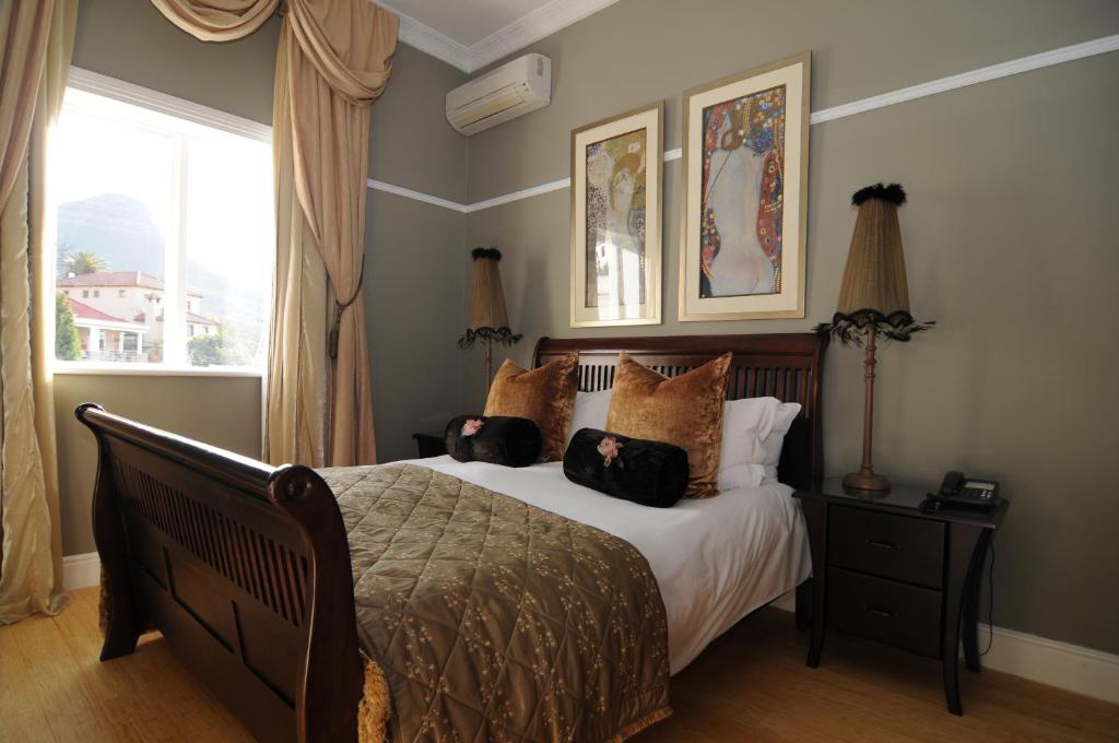 Krevet ili kreveti u jedinici u objektu Abbey Manor Luxury Guesthouse