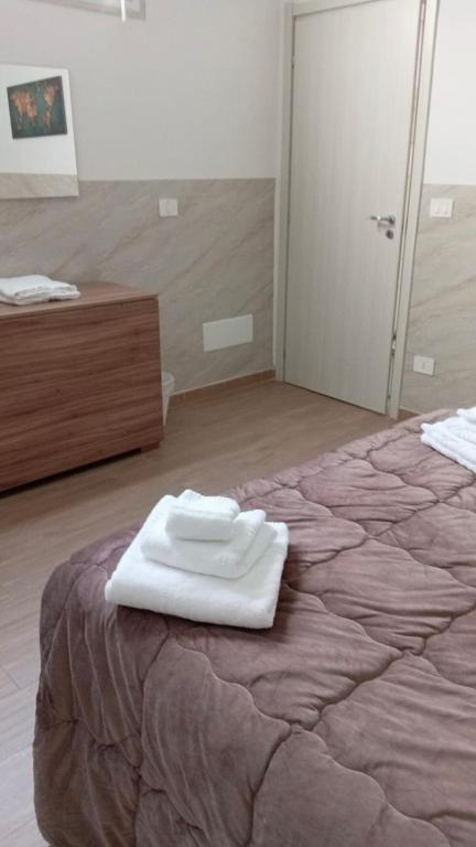 Postel nebo postele na pokoji v ubytování Home Sweet Home da Viky