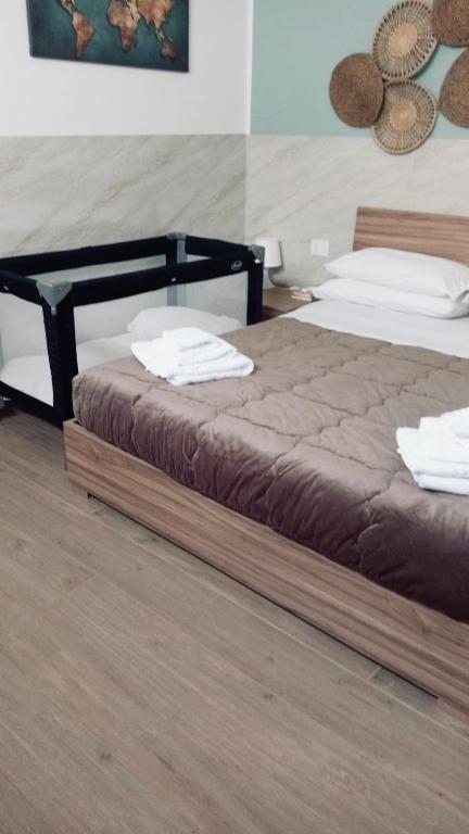 Postel nebo postele na pokoji v ubytování Home Sweet Home da Viky