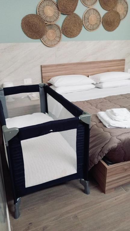Postel nebo postele na pokoji v ubytování Home Sweet Home da Viky