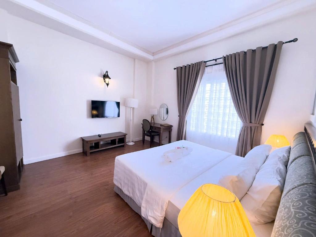 TV a/nebo společenská místnost v ubytování Phoenix Hotel Vung Tau