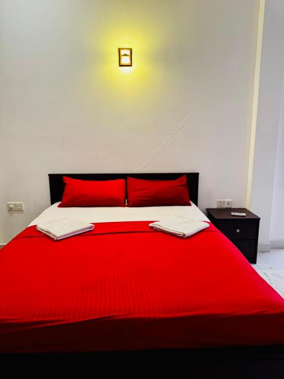 Postel nebo postele na pokoji v ubytování Mamma Raji Hotel - Freedom Paradise