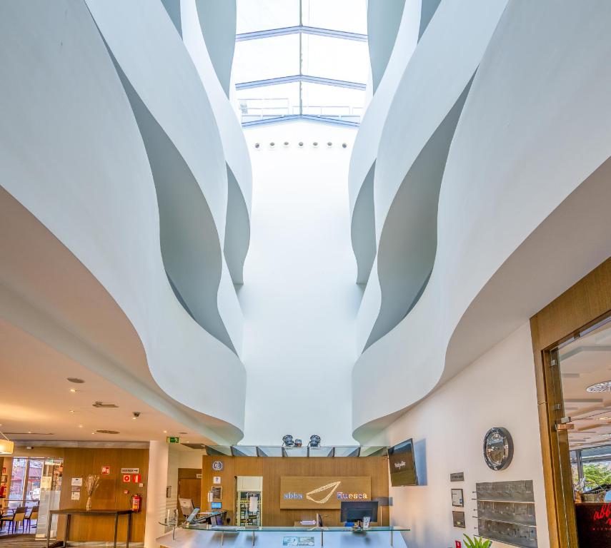 a view of the lobby of a building with a skylight at Abba Huesca in Huesca