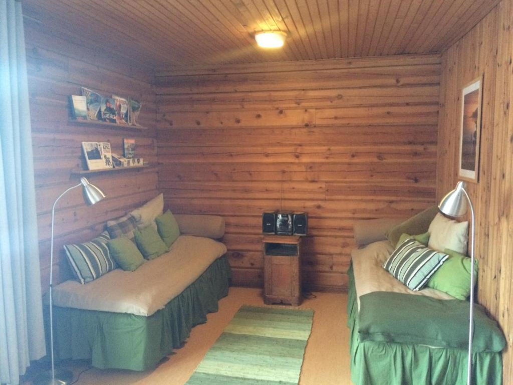 Postel nebo postele na pokoji v ubytování Ösjönäs