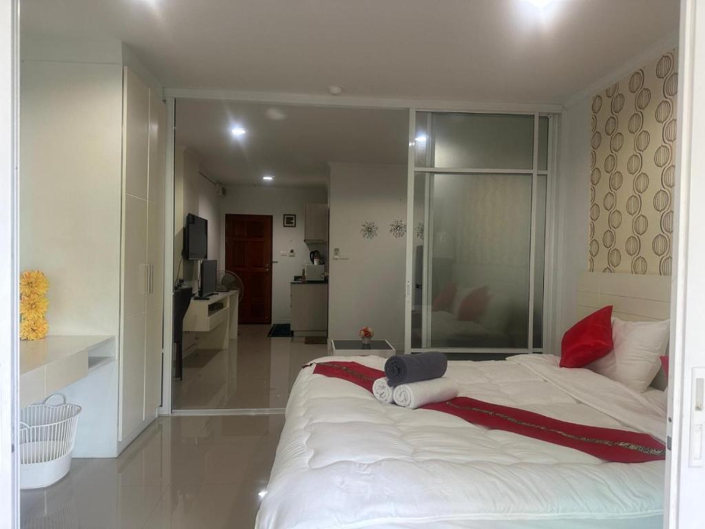 Postel nebo postele na pokoji v ubytování Baan Klang Condo in Central Hua Hin