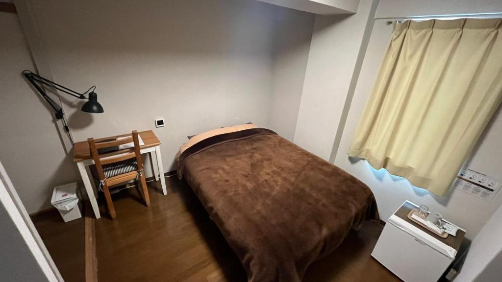 Postel nebo postele na pokoji v ubytování Easy Stay Chichibu