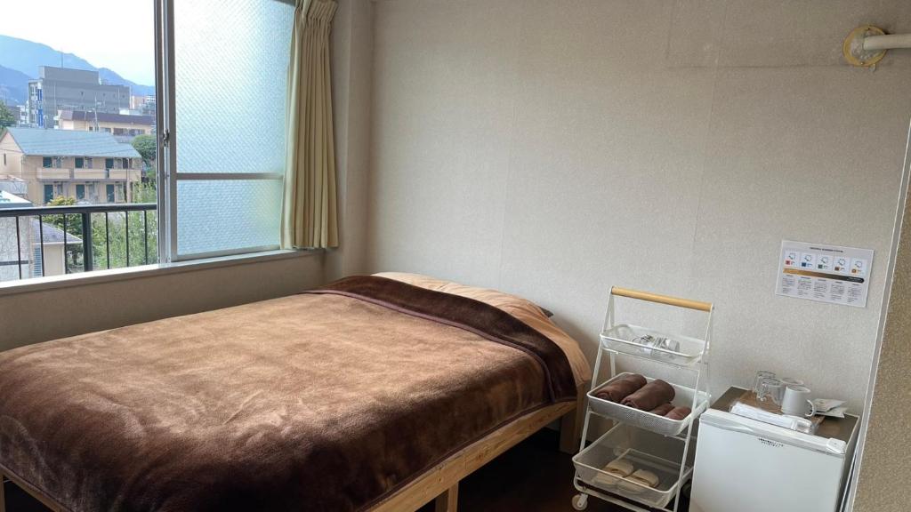 Postel nebo postele na pokoji v ubytování Easy Stay Chichibu