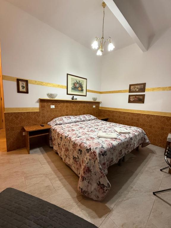 Postel nebo postele na pokoji v ubytování hotel fiumara