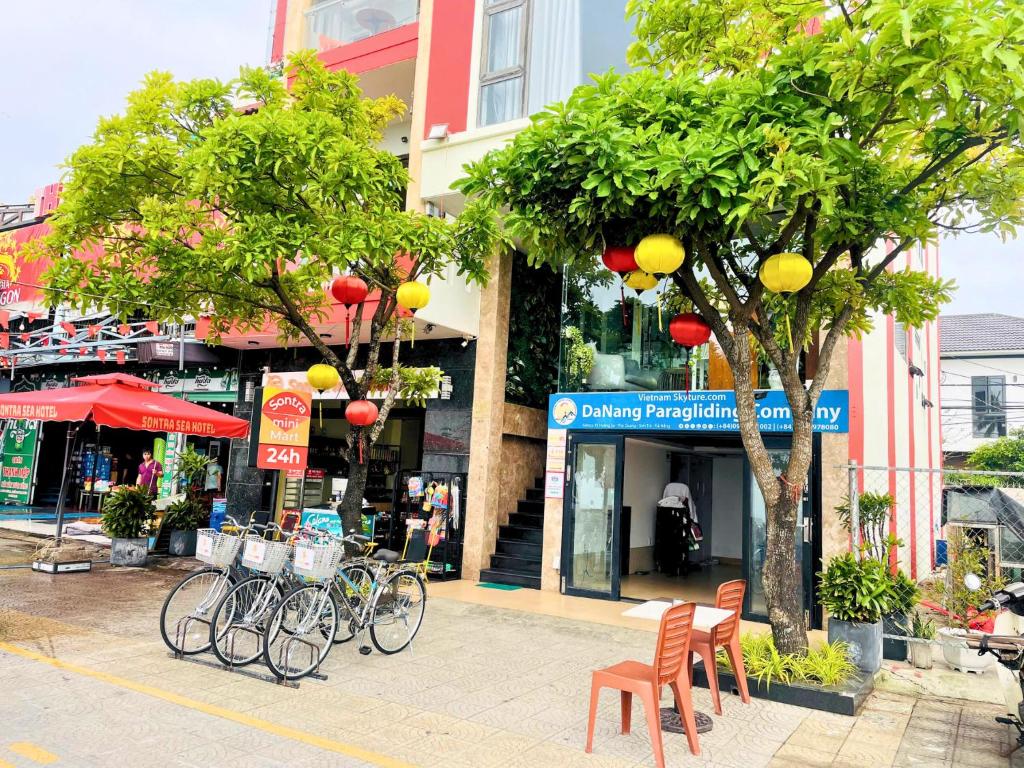 a group of bikes parked in front of a building at Sontra Sea Hotel in Danang