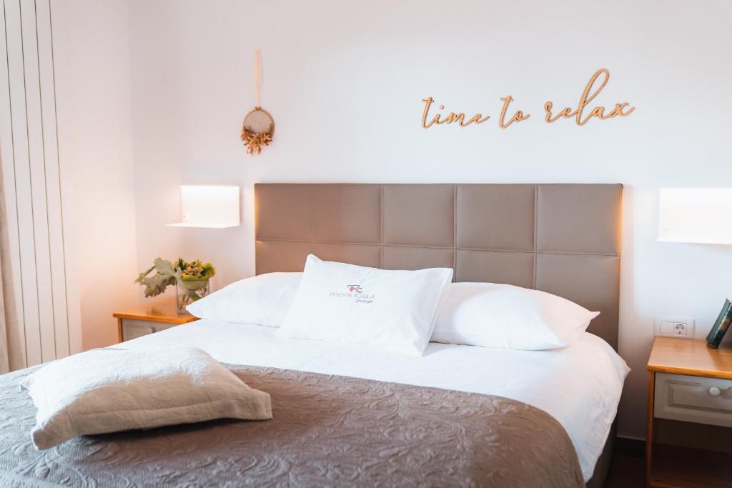 Postel nebo postele na pokoji v ubytování Hotel Penzion Kobala