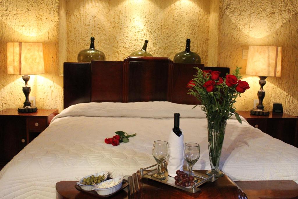 Postel nebo postele na pokoji v ubytování Hotel Casona de Manzano