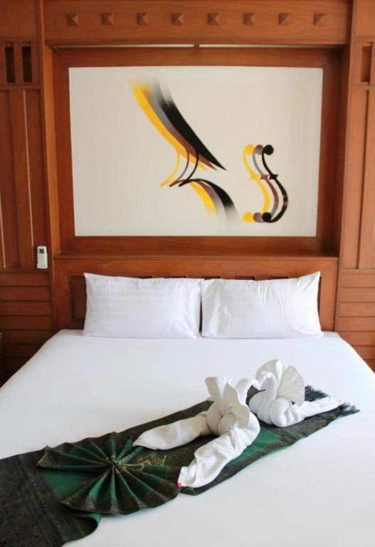 Postel nebo postele na pokoji v ubytování Cocoon Talya Hotel