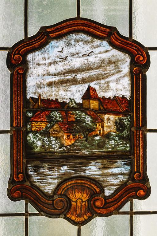 a picture of a painting of a house at The Benjamin House in Rīga