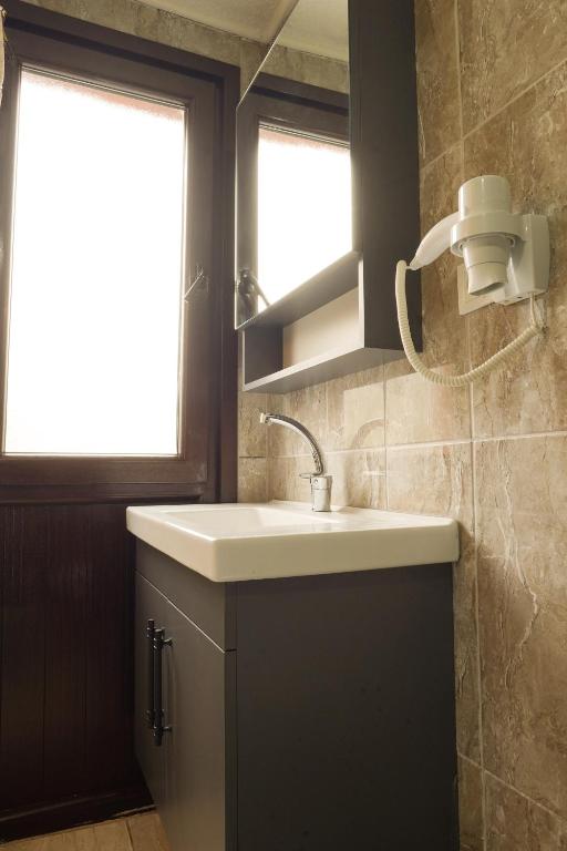 Kuchyň nebo kuchyňský kout v ubytování Ararat Hotel